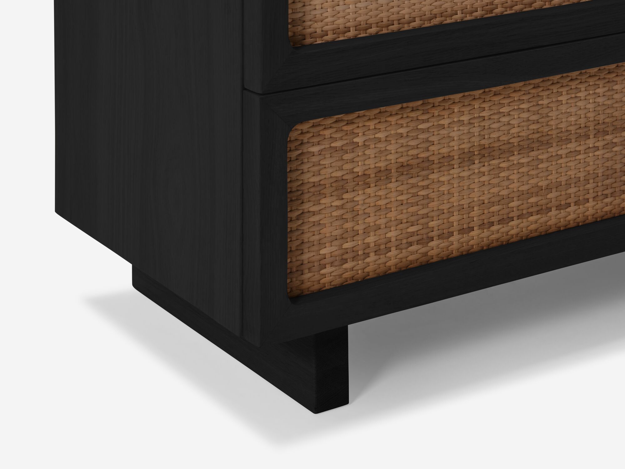 Black oak chest with woven drawer fronts bottom detail view